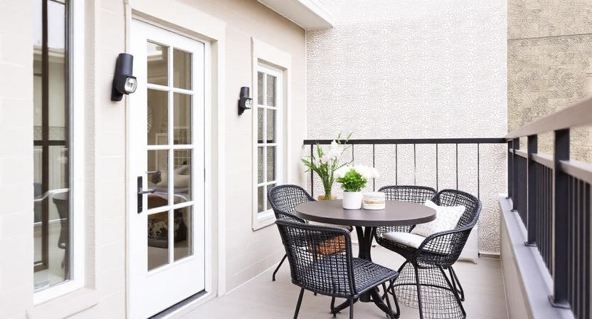 Chic Balcony with Geometric Tile Patterns on Walls
