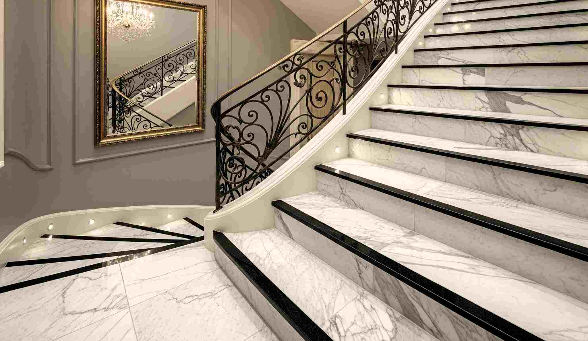 Curved Marble Stairs with Luxury Tile Accents