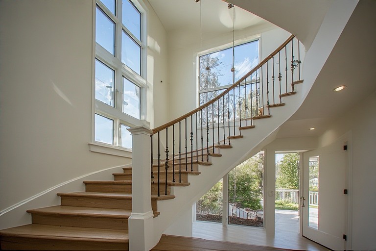 Floor-to-Ceiling Staircase Window Design