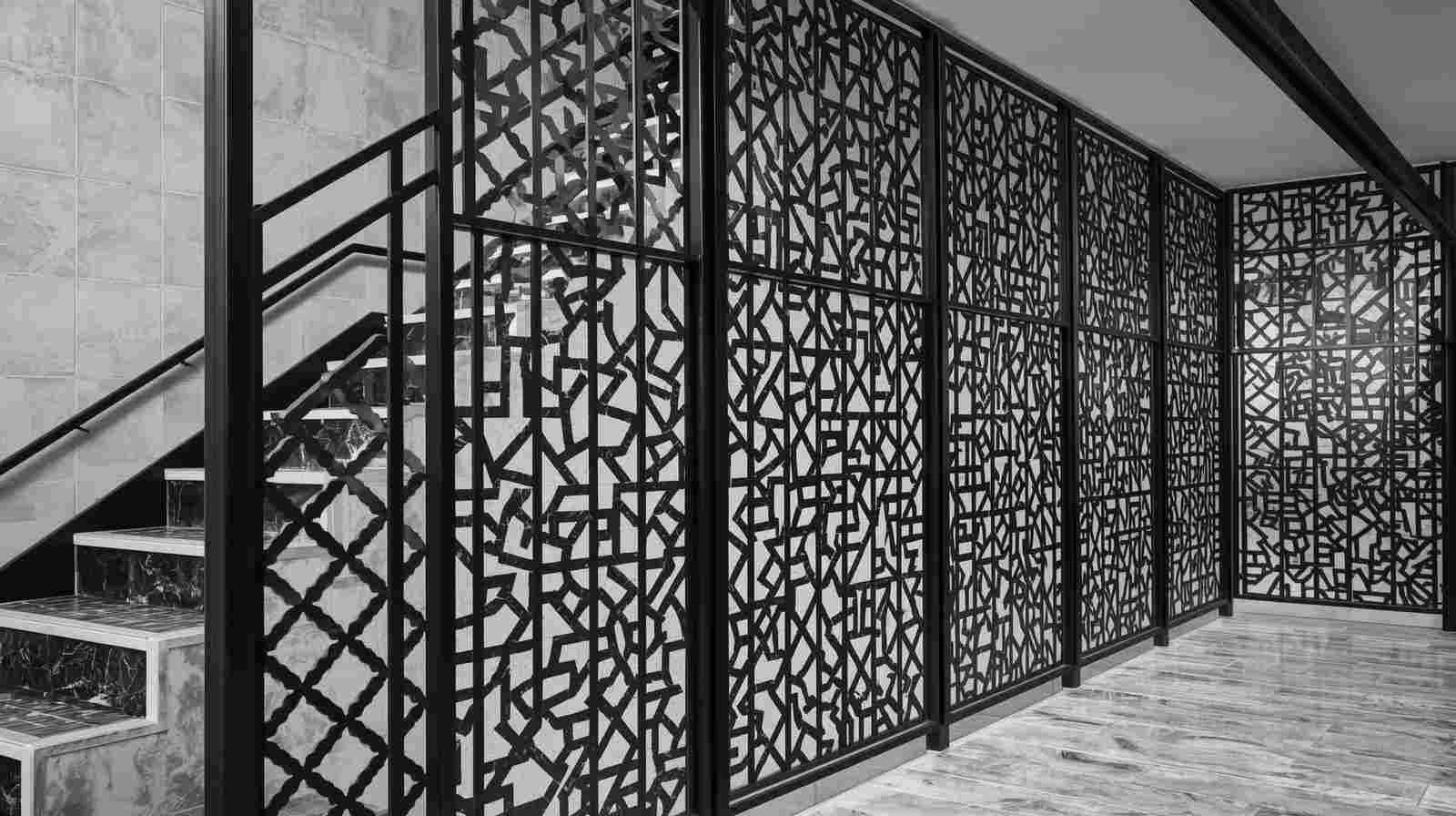 Geometric Tile Patterns on Metal Frame Partitions