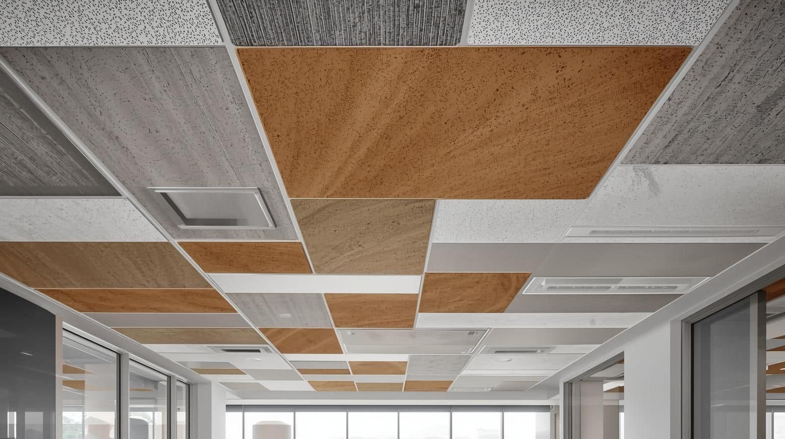 Hybrid Ceiling Design with Gypsum and Tiles.