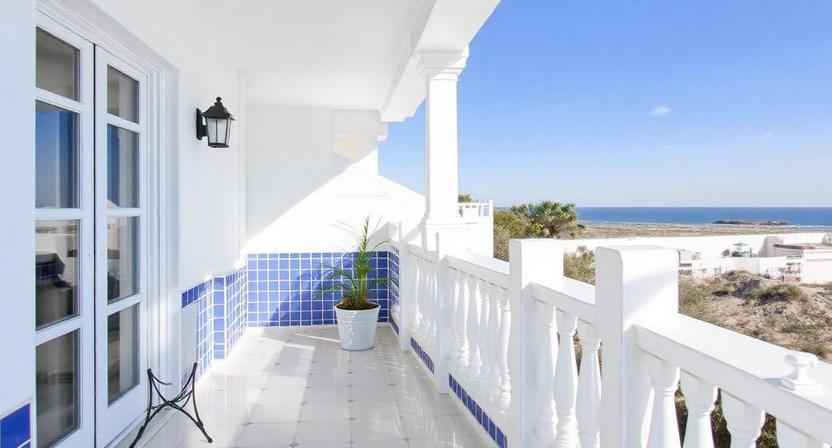 Mediterranean Balcony with White and Blue Tiles