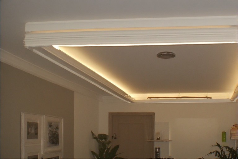 Minimalist border roof ceiling design with hidden LED safety lighting