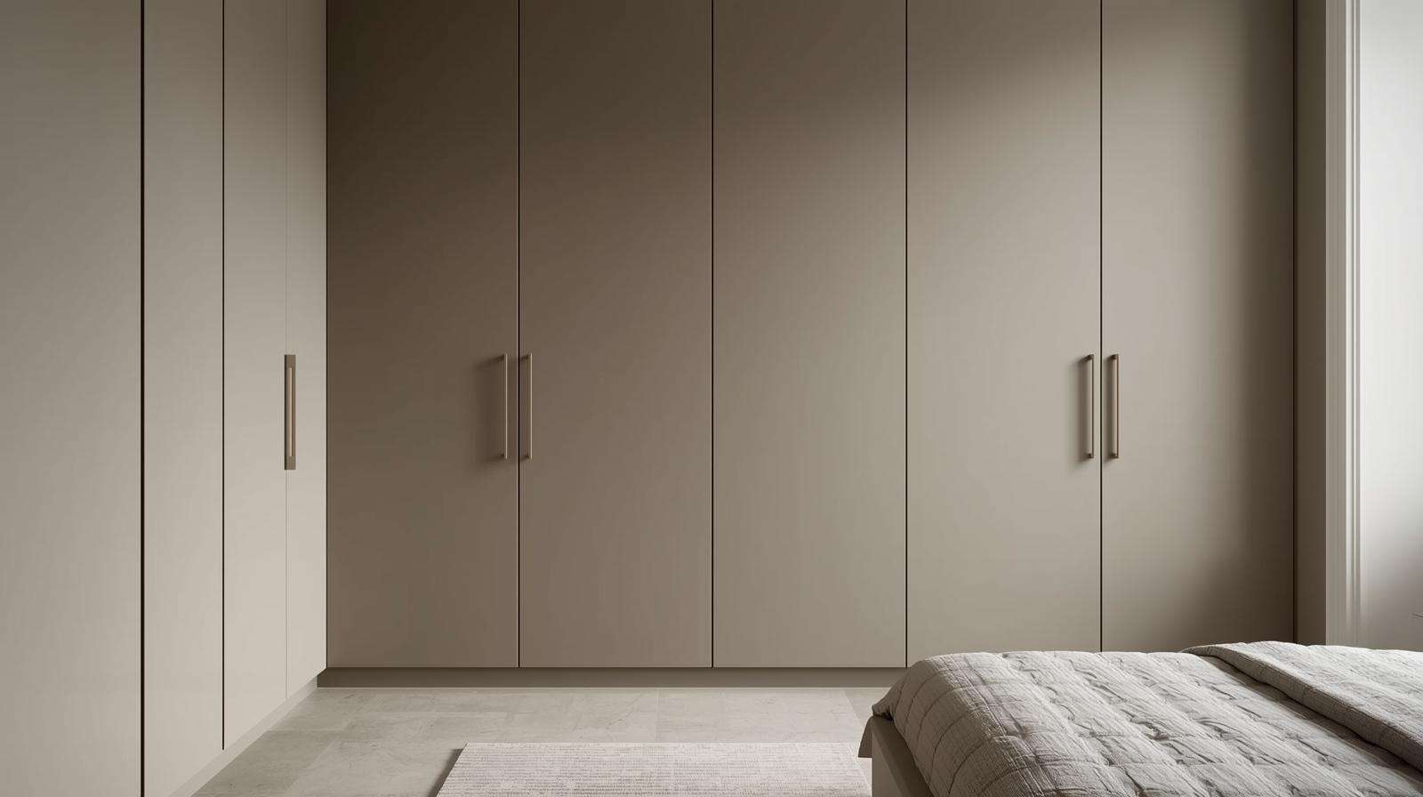 Minimalist wardrobes with clean lines bring simplicity and sophistication to modern bedroom interiors.