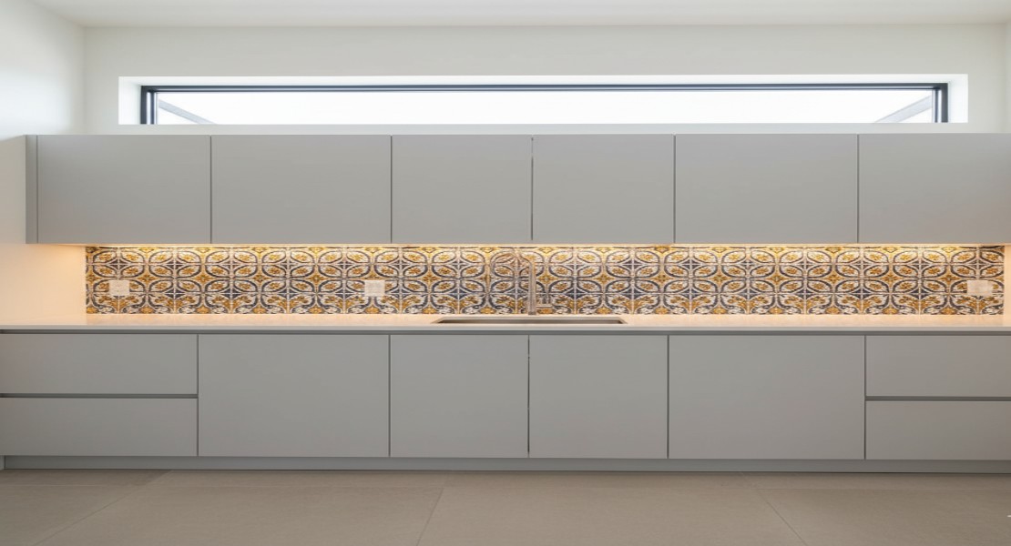 Transom Windows Above Split Cabinets with Artistic Tiles